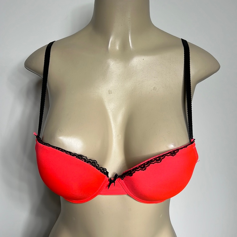 XOXO 34B orange bra with black lace trim
